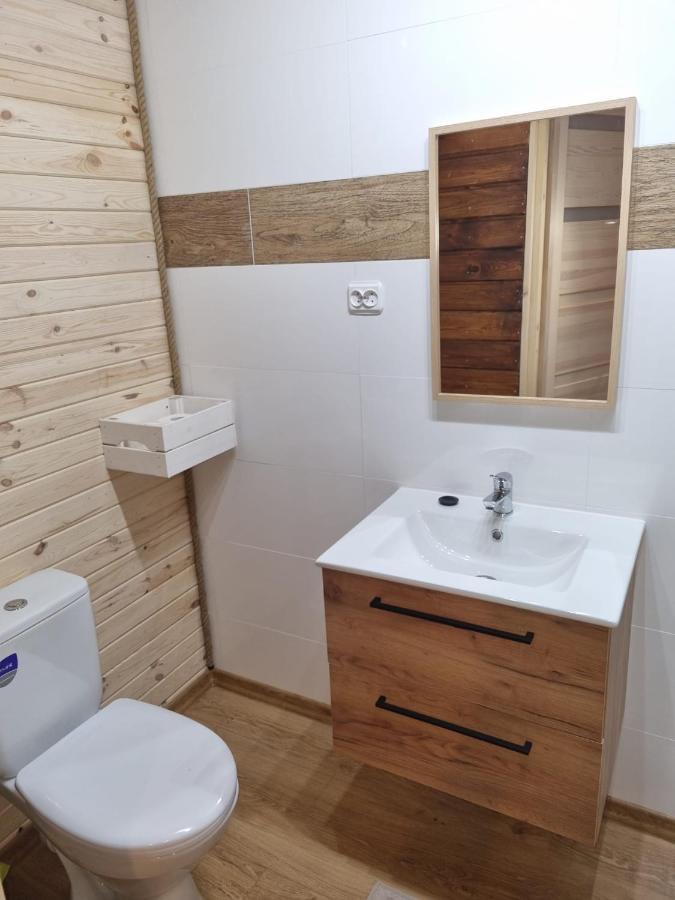 Domki Pod Debami Pobierowo Exteriör bild