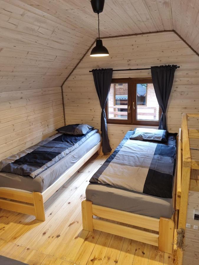 Domki Pod Debami Pobierowo Exteriör bild
